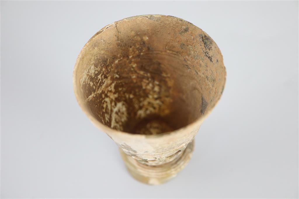 An Islamic colourless glass goblet, Iran, 12th century, 11.5cm high